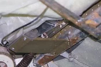 Brackets installed on forward carry-through spar
