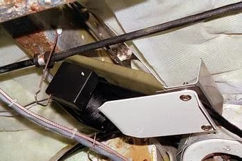 Reel bracket and dress plate assembly