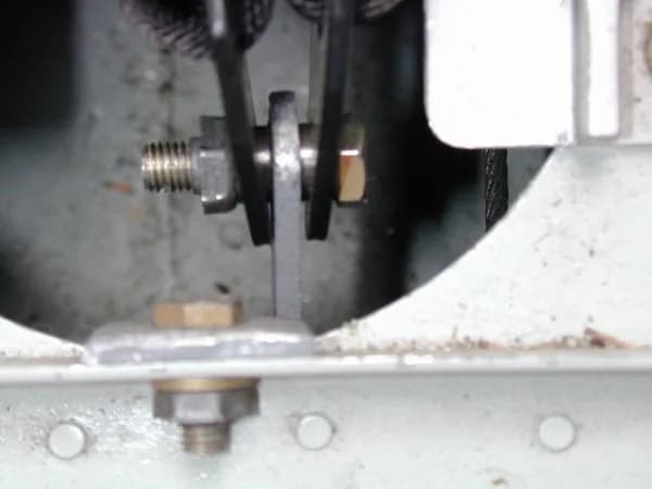 Inboard lap belt attachment